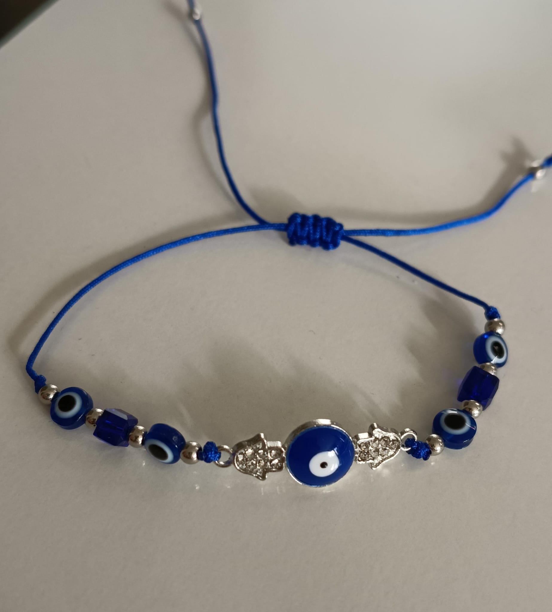 Pulsera de Protección Ojo Turco y Mano de Fátima (Acero e hilo azul)